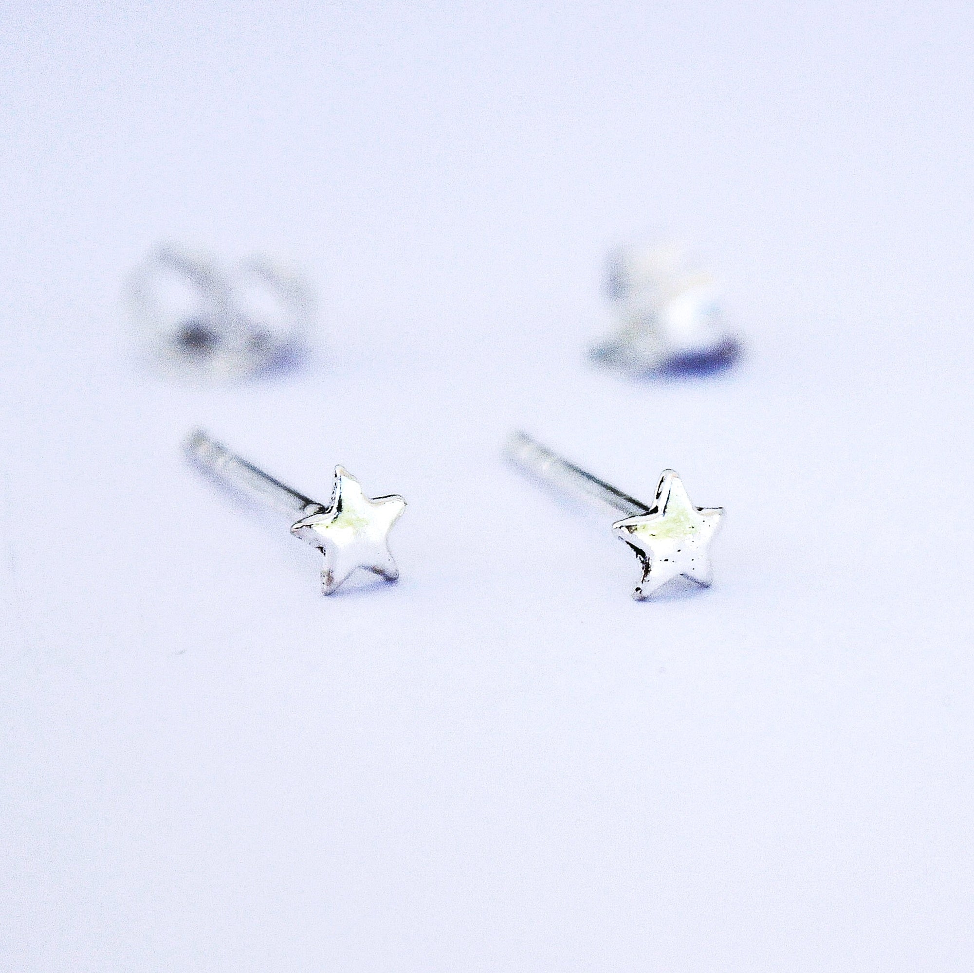 TINY STAR STUD EARRING