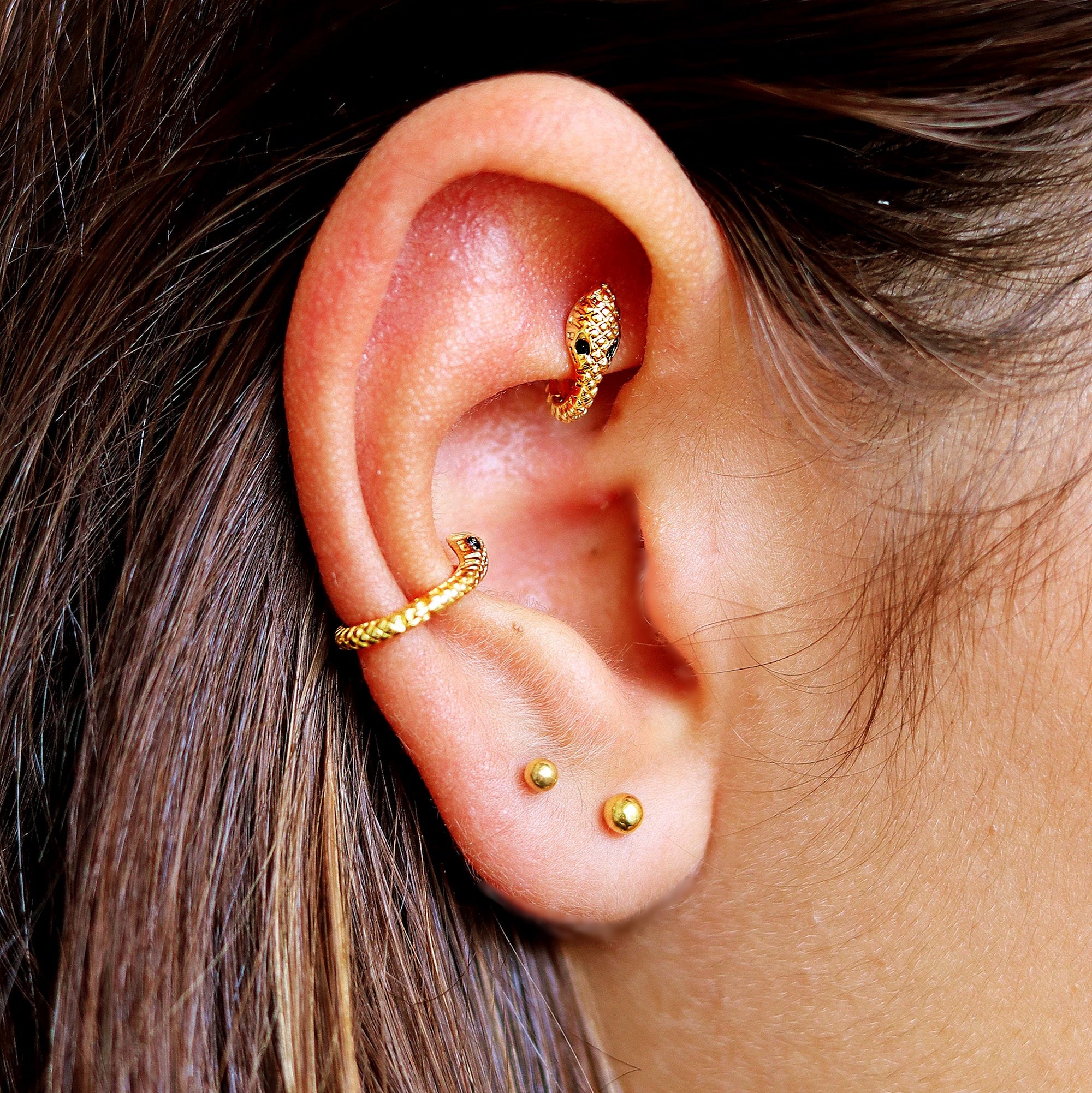 Snake Piercing - Helix, Tragus, Conch