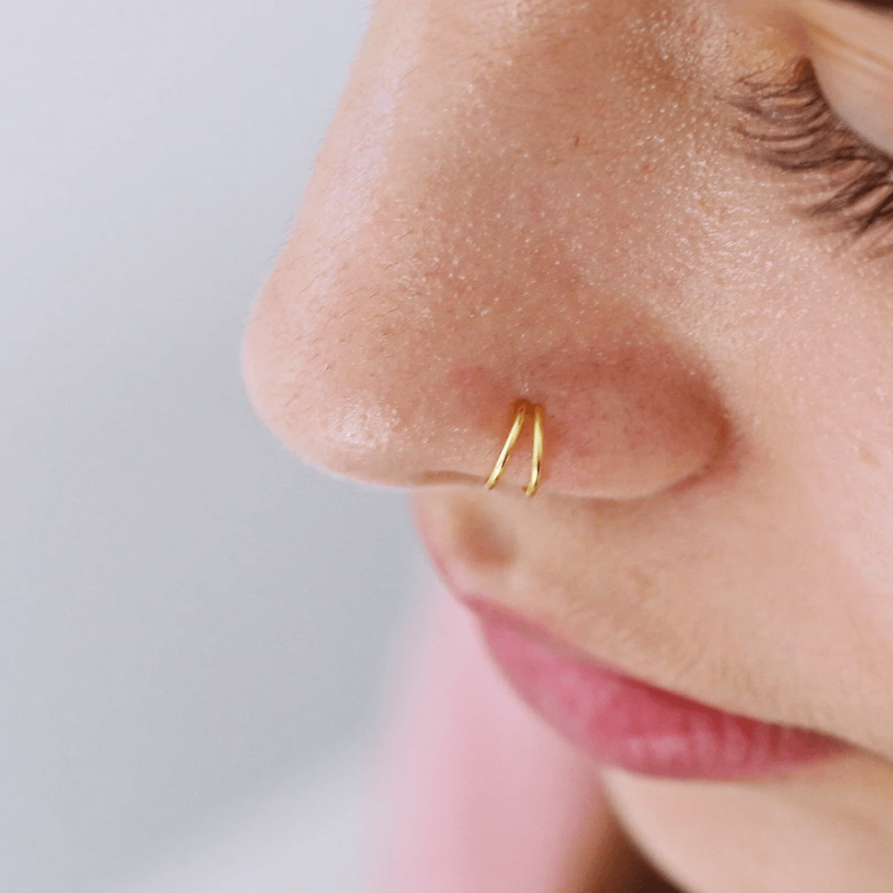 How to Put in a Hoop Nose Ring for Beginners — THE PIERCING OUTLET
